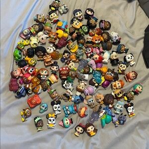 a bunch of random disney doorables